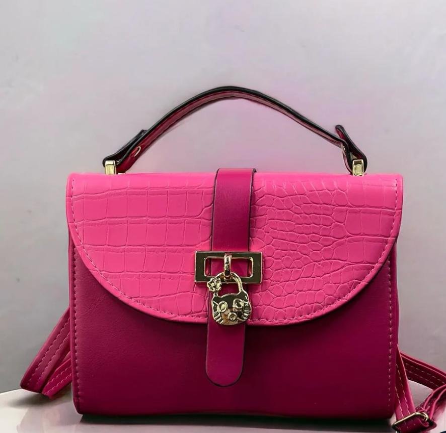 Cute look metallic buckle hand bag